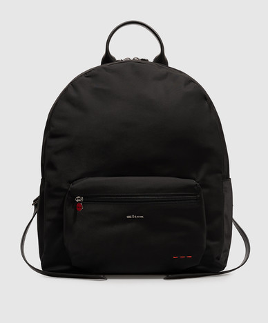 Black backpack with metal logo