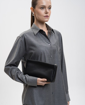 The Row Black leather clutch with logo W1867L624