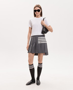Thom Browne Gray pleated wool skirt with branded stripes FGC402V06146