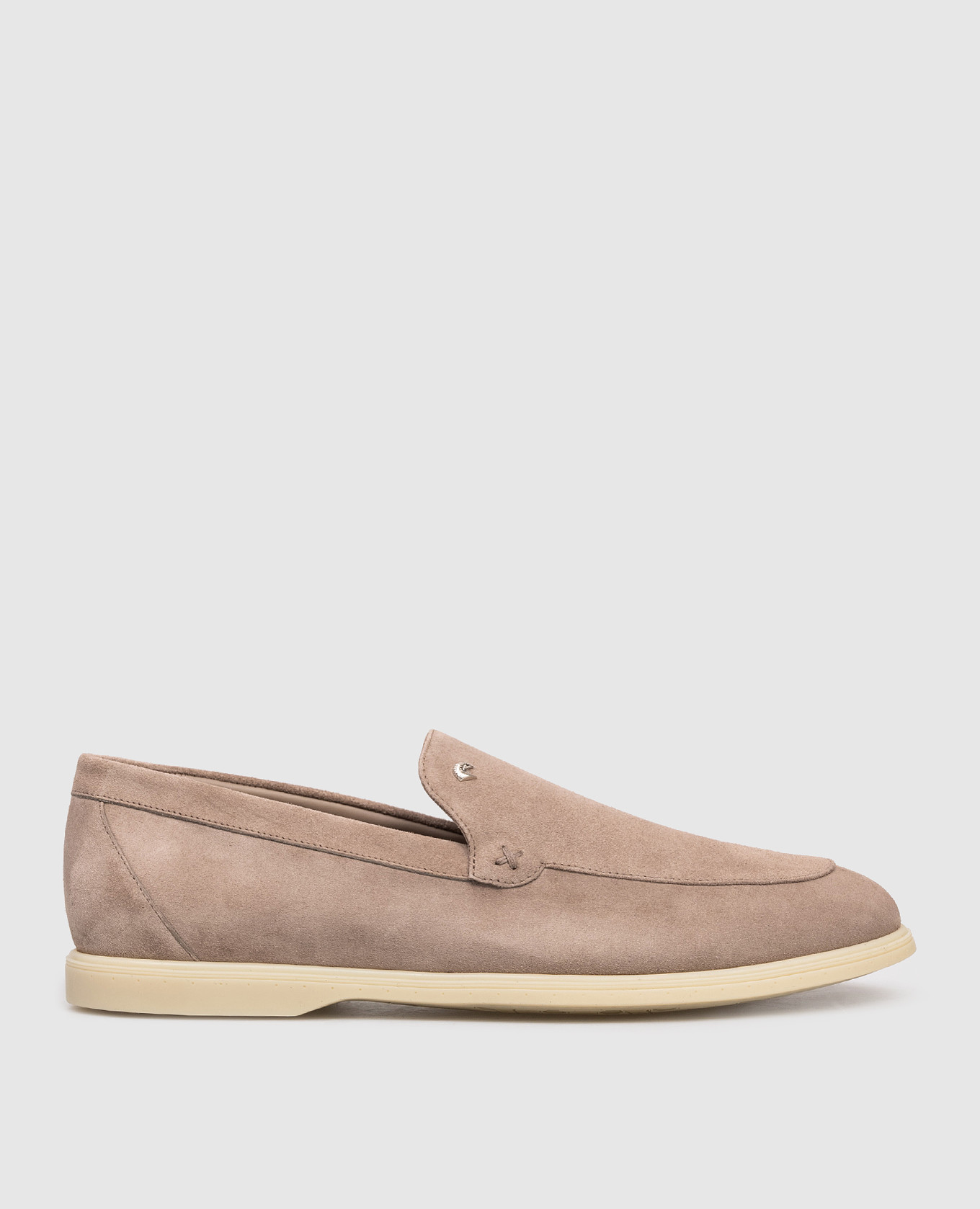 Beige suede loafers with emblem