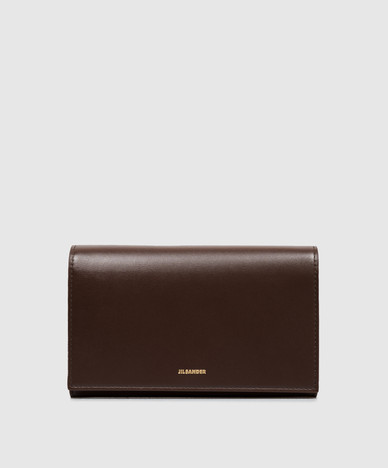 Brown leather bag with logo print