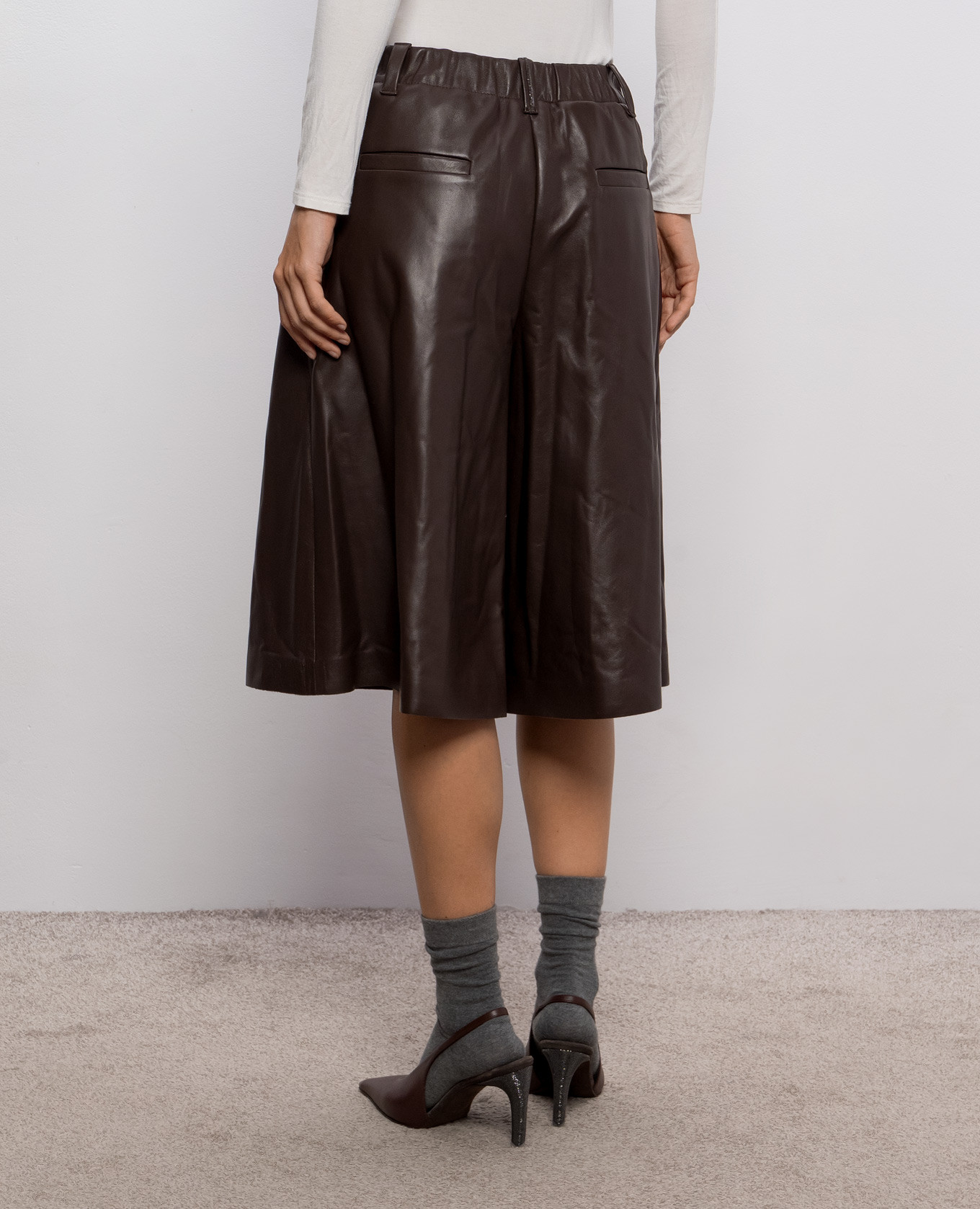 

Brown leather Bermuda shorts with monil chain Brunello Cucinelli