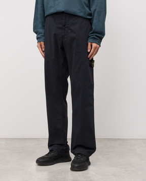 Stone Island Blue pants with logo patch K2S153100035S0A10