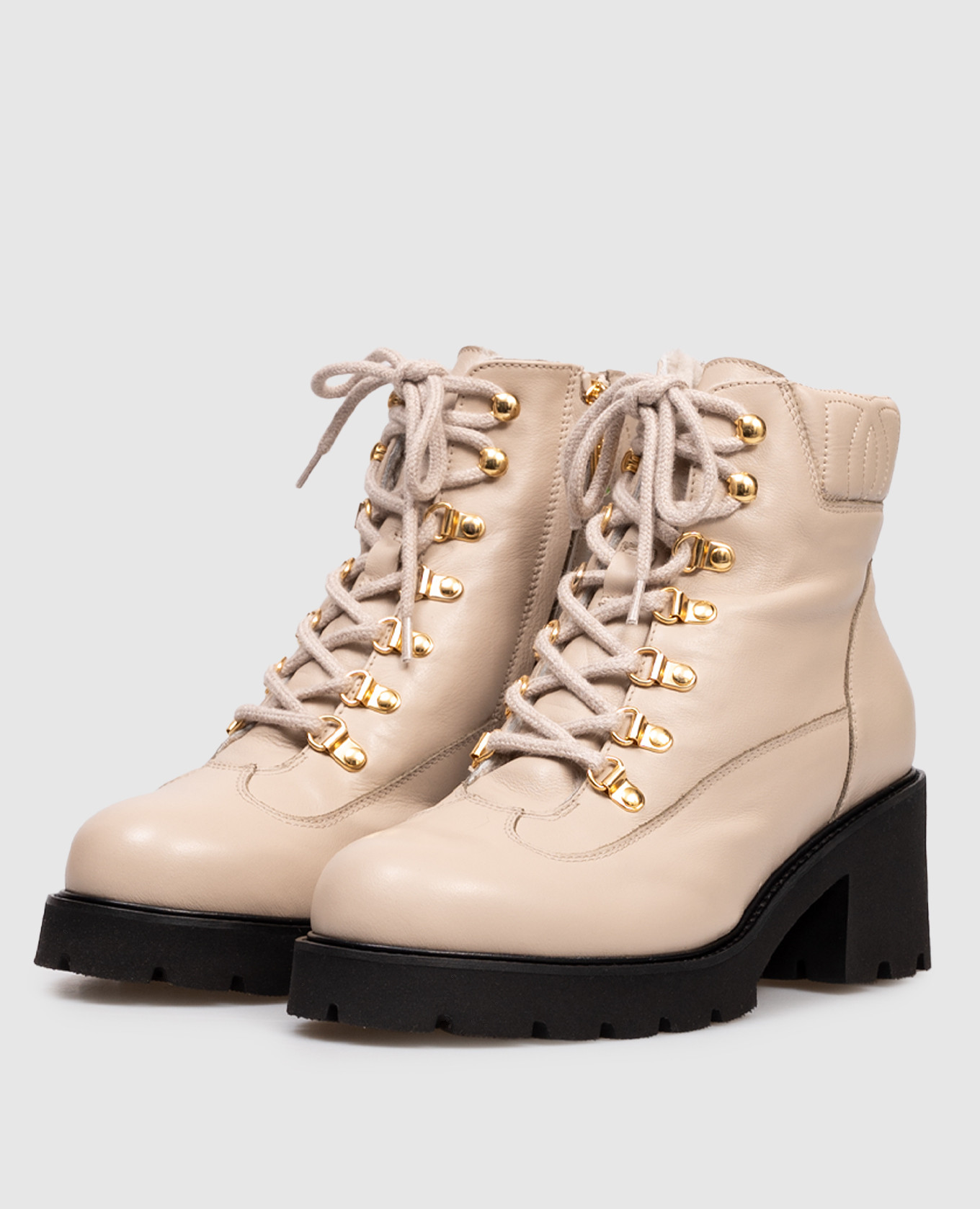 

Beige leather boots with fur trim Doucal's