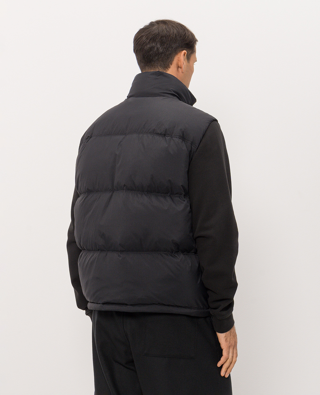 Black down vest with logo patch Stone Island 4
