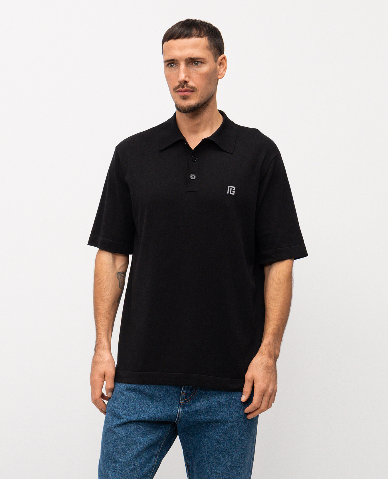 

Black polo with emblem pattern Balmain