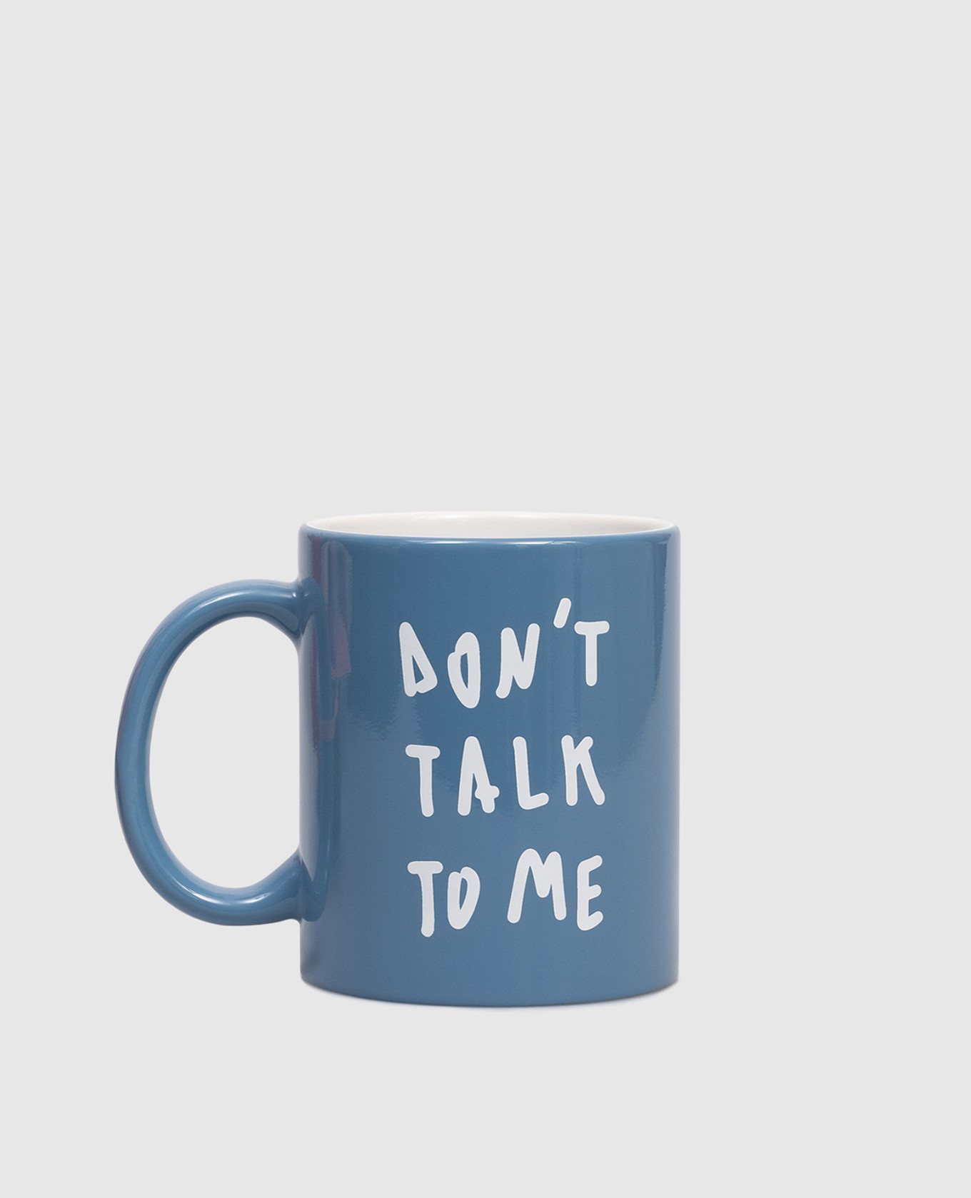 

Blue ceramic cup with the inscription Don't Talk to Me Max & Co