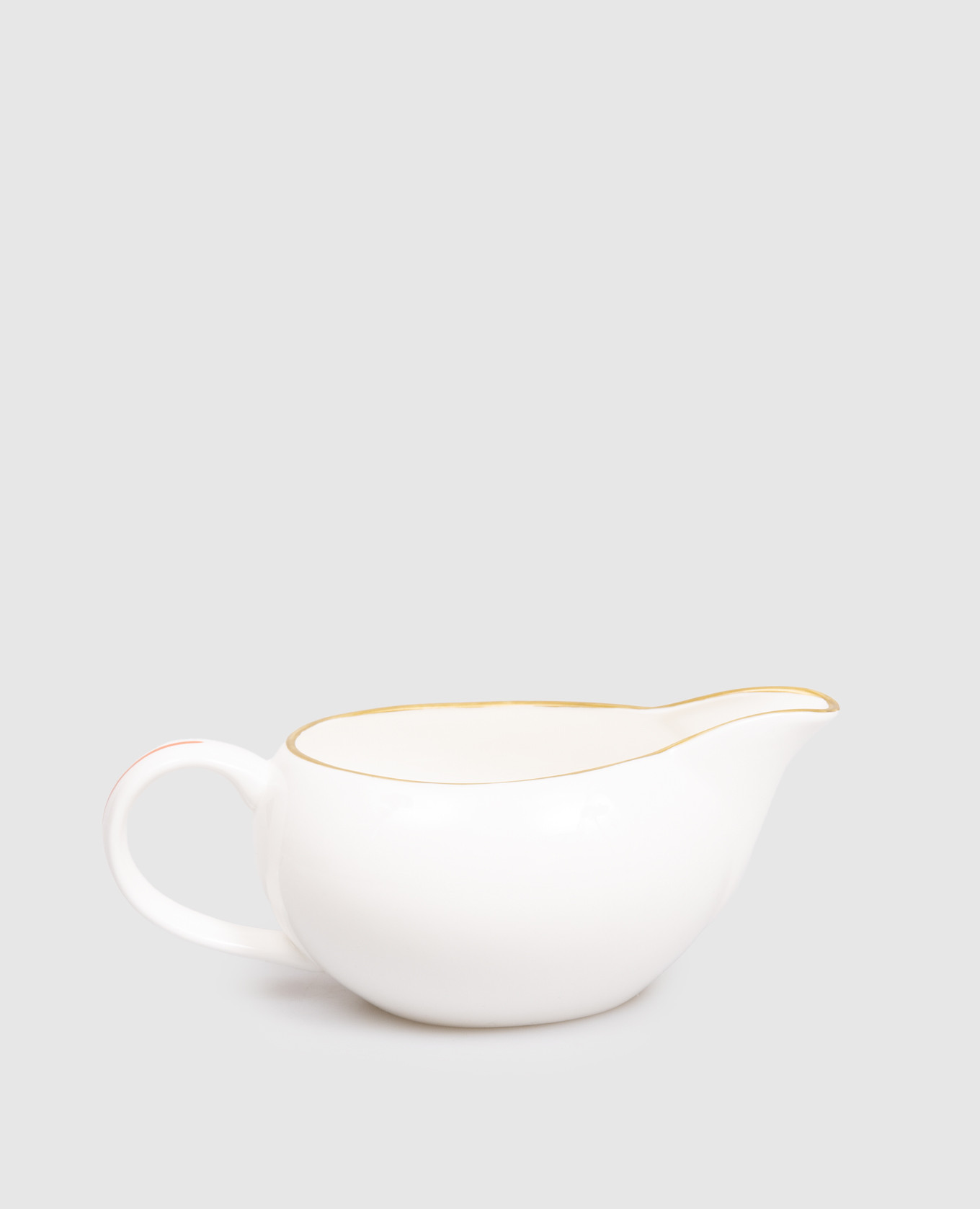 White porcelain sauceboat Striche Arancio e Oro