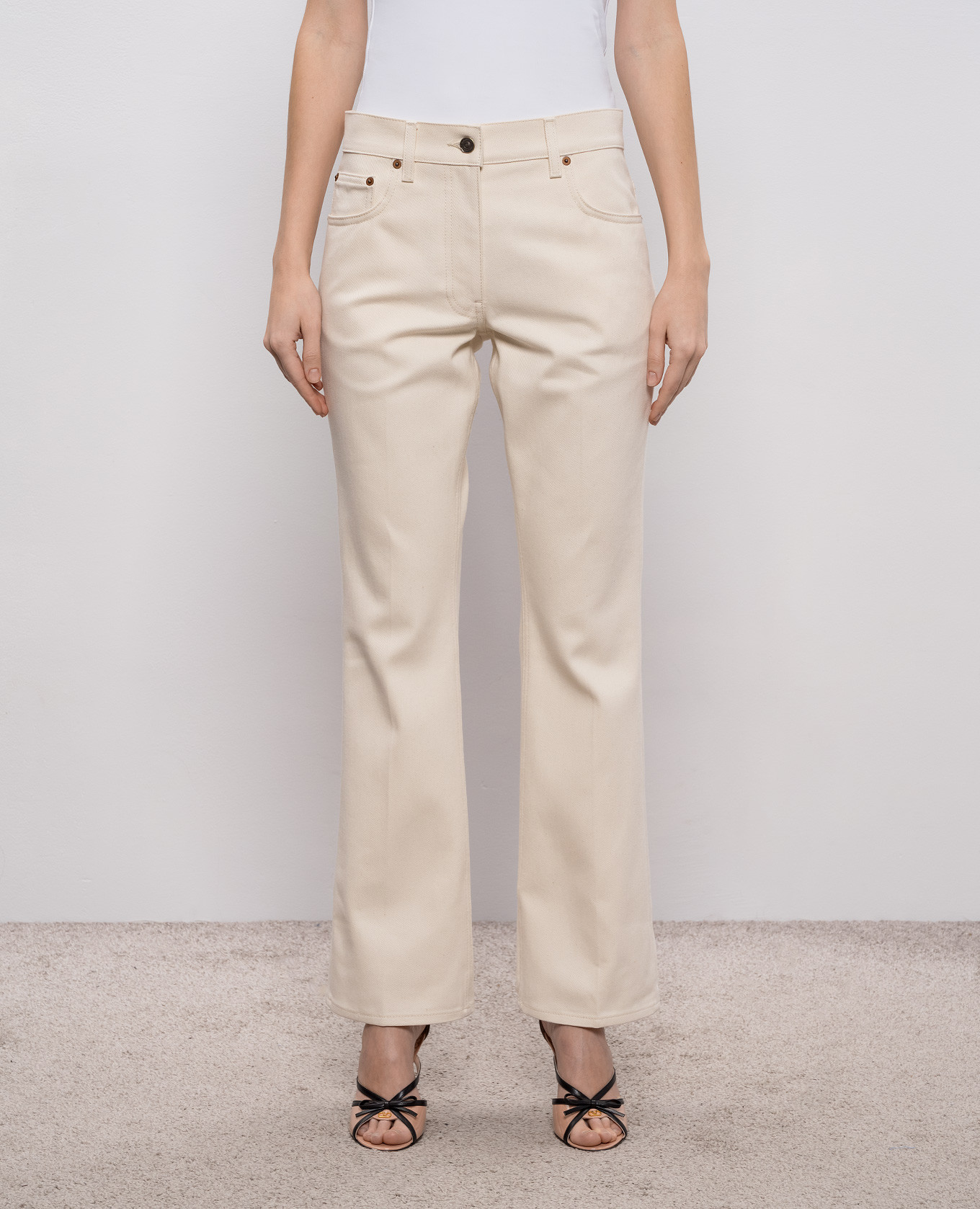 

Beige flared jeans with logo patch Valentino