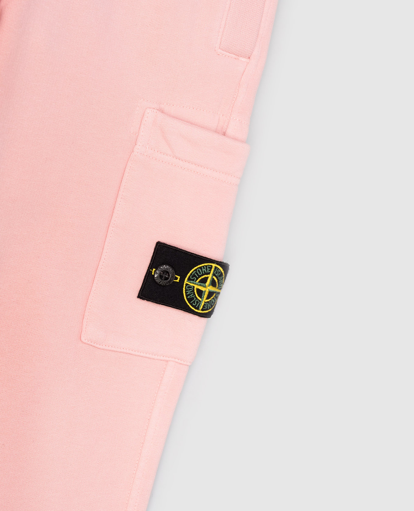

Kids' pink joggers with logo patch Stone Island