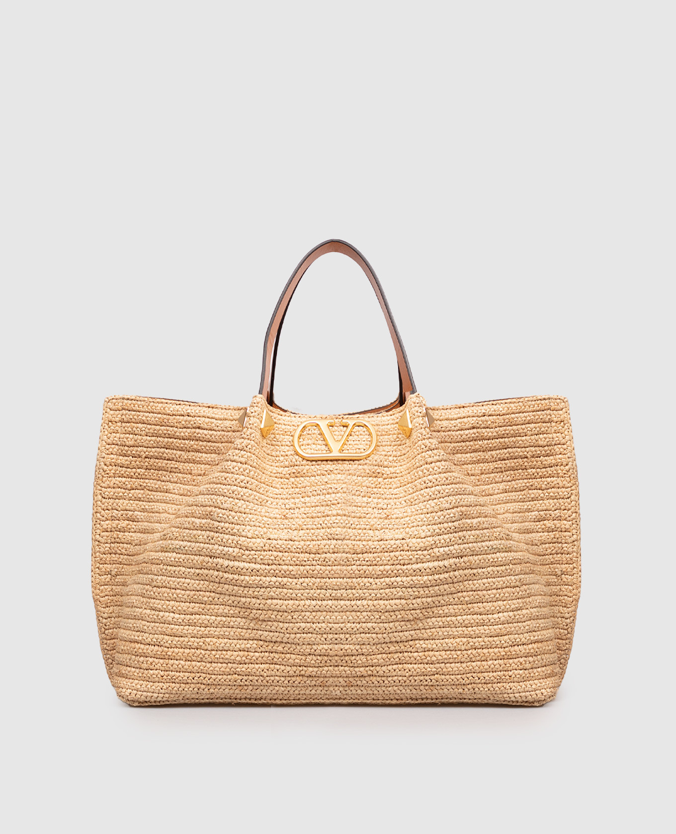 

Beige raffia tote bag Valentino