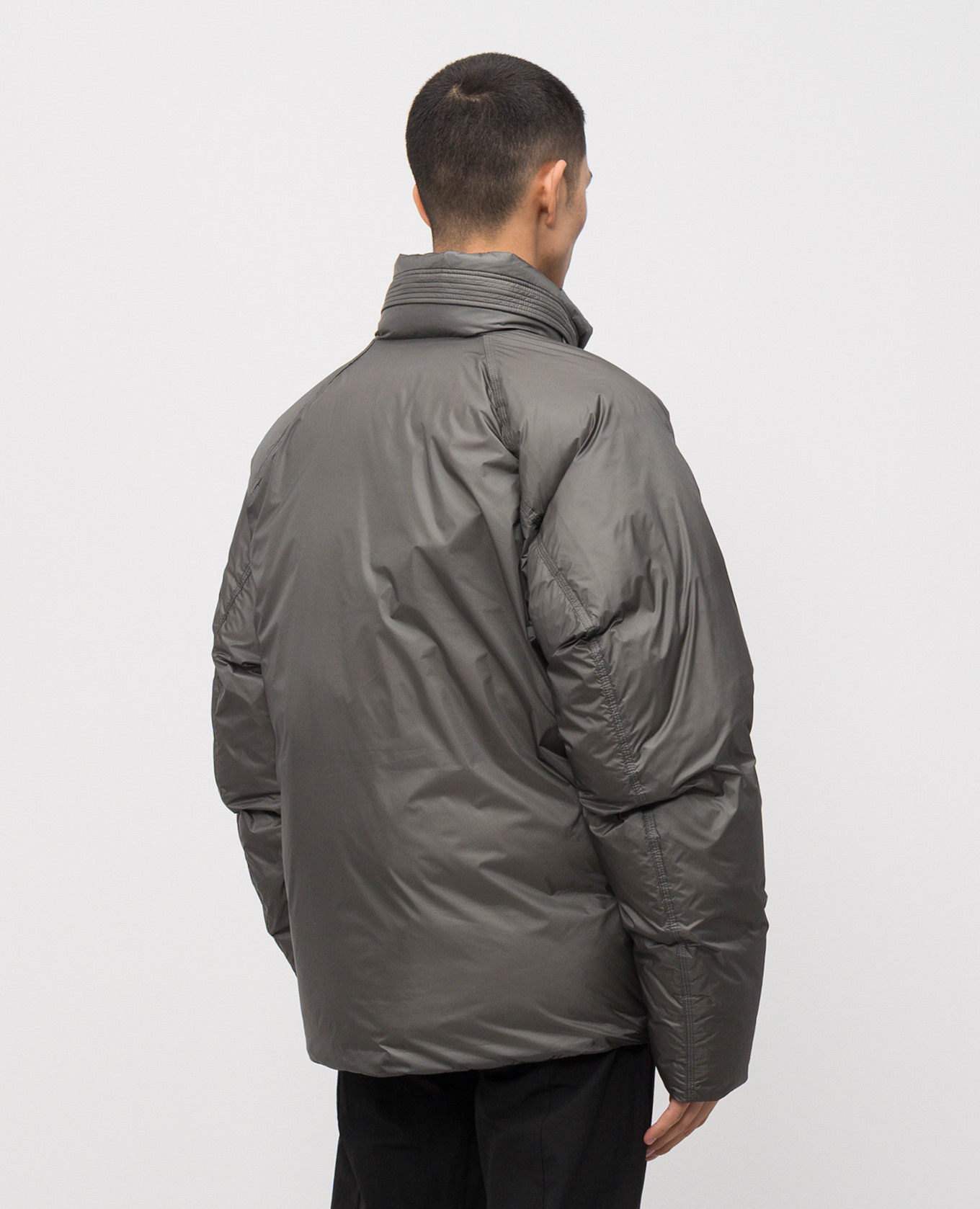 

Grey down jacket with logo patch C.P. Company