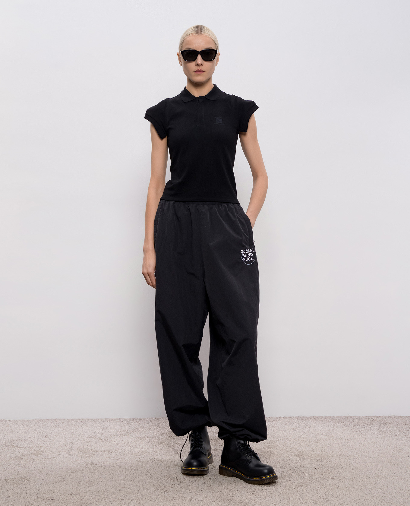

Black polo with decorative sleeves Vetements