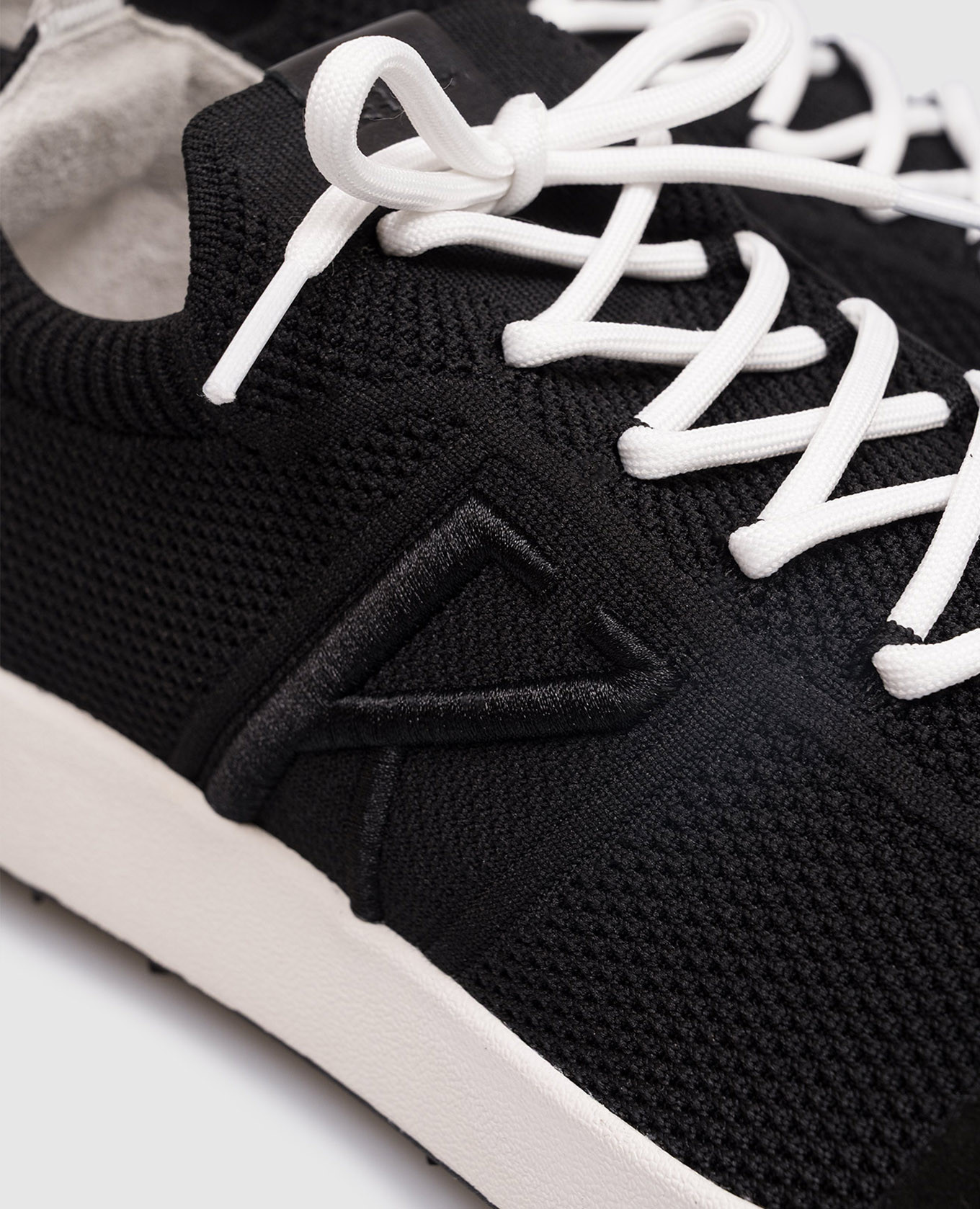 

Black sneakers with monogram embroidery Kiton