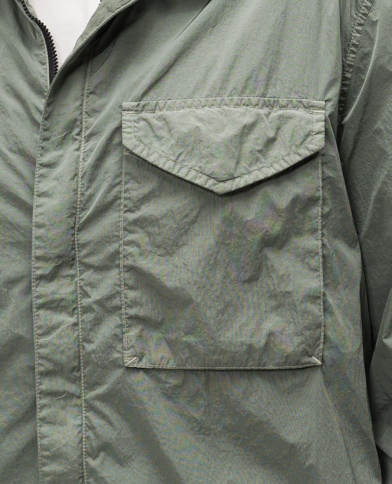 

Green windbreaker with logo patch C.P. Company