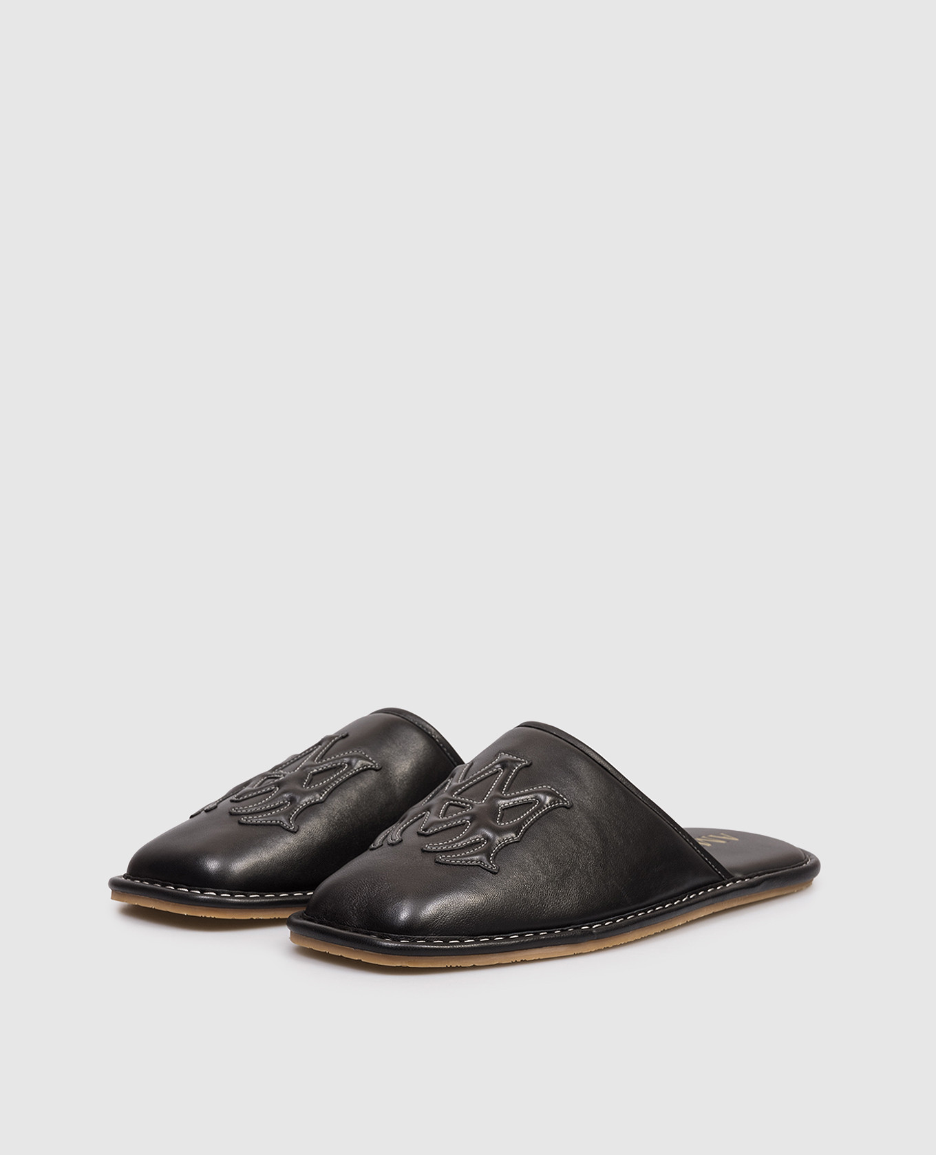 

Black leather slippers with logo patch AMIRI