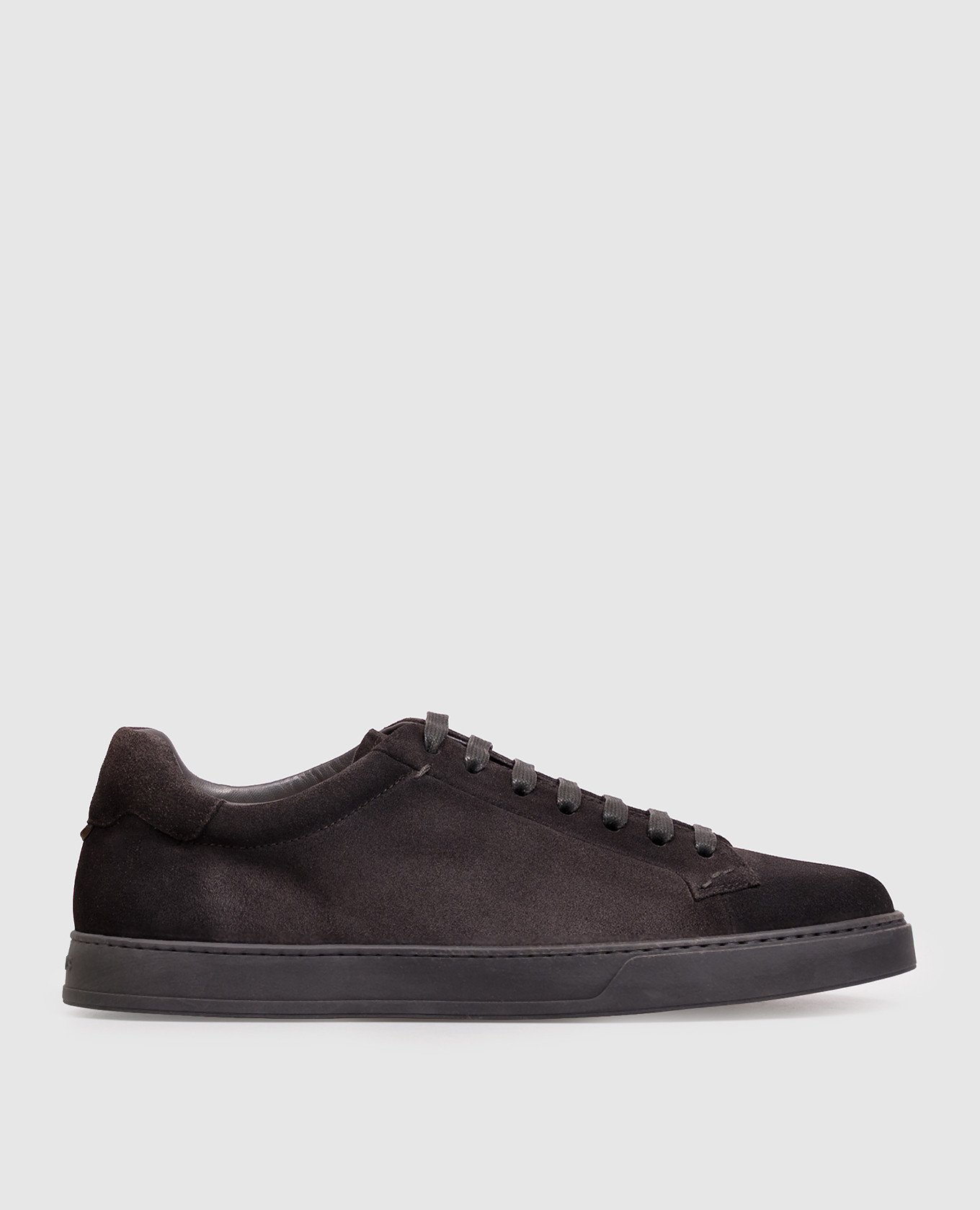 Black suede sneakers with a worn effect