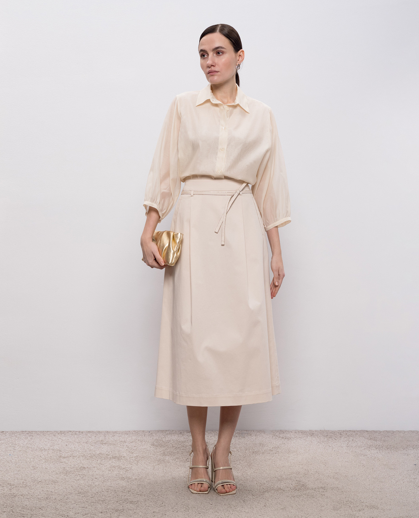 

Beige silk blouse with monil chain Peserico