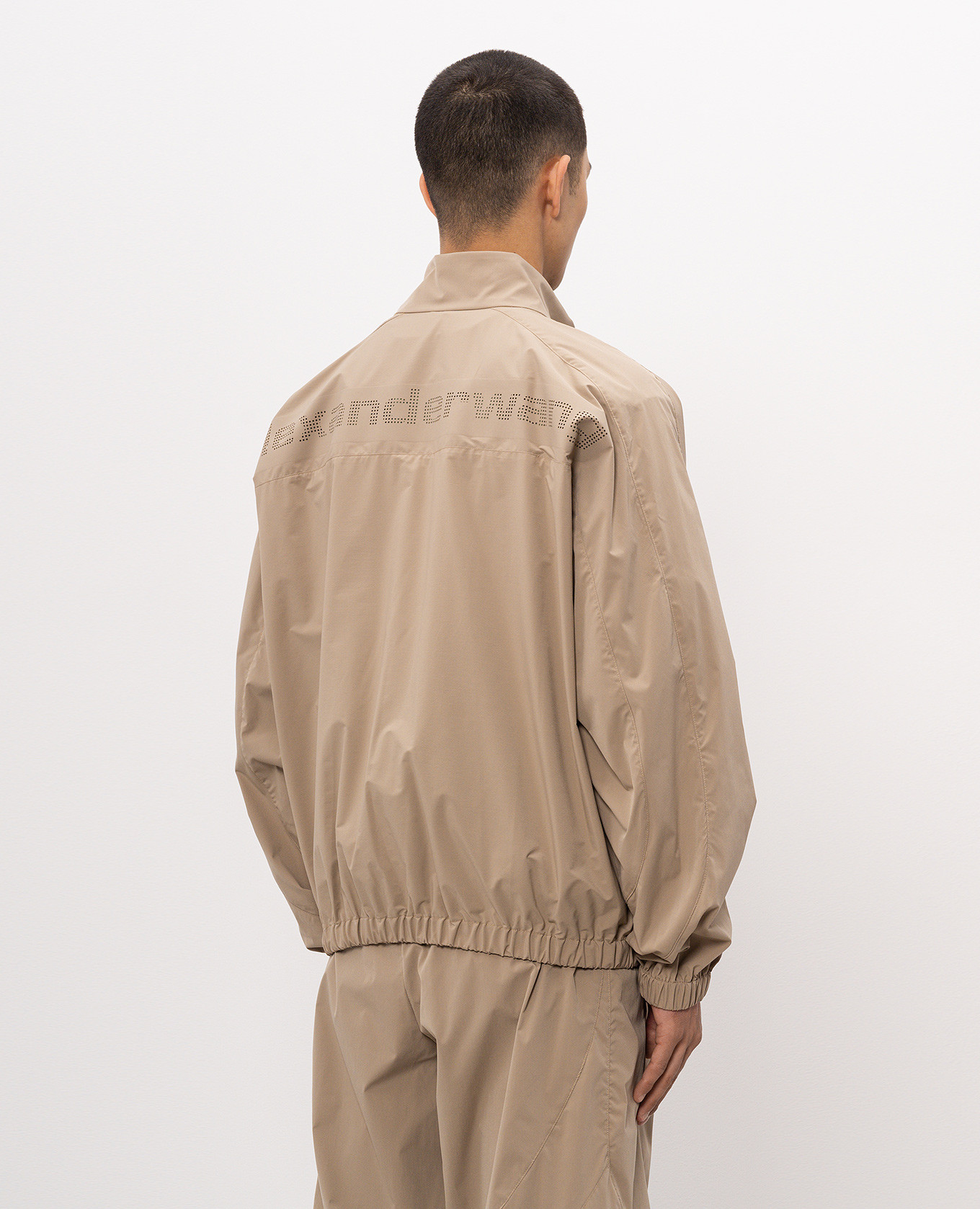 

Beige perforated sports jacket Alexander Wang