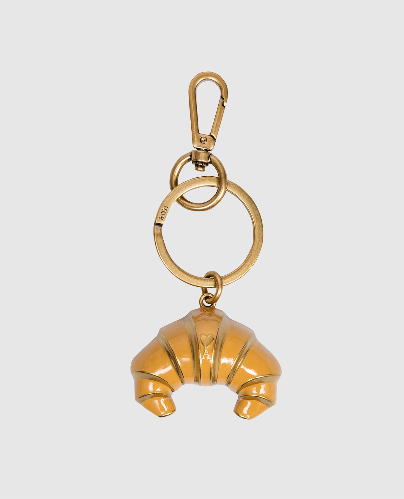 

Brown croissant keychain with emblem Ami Paris