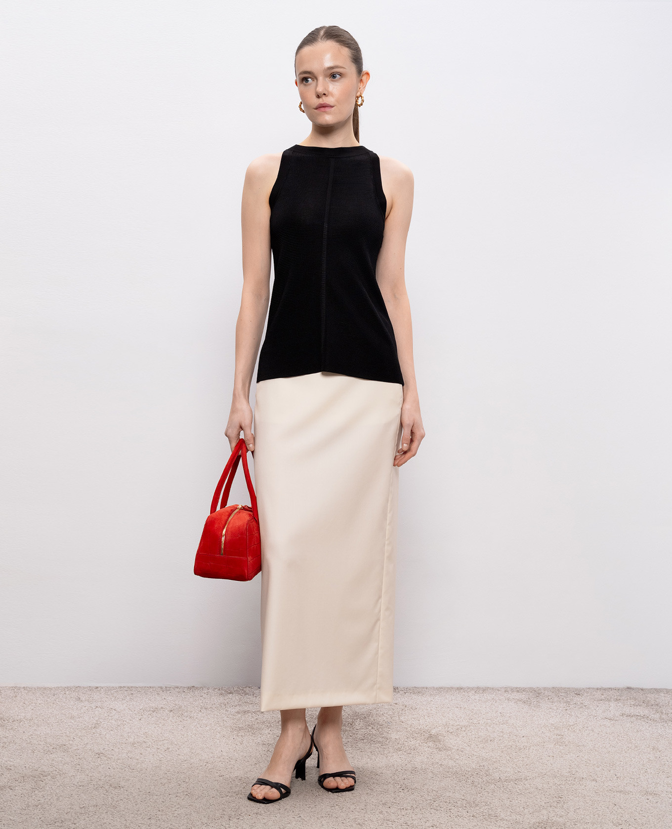 

Beige CARA wool skirt Loulou de Saison