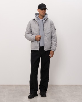 Stone Island Blue jacket with logo patch L2S15Q100021S0474
