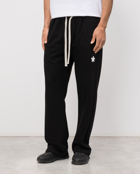 Comme des Fuckdown Black sweatpants with logo print FMS6CFABM01906