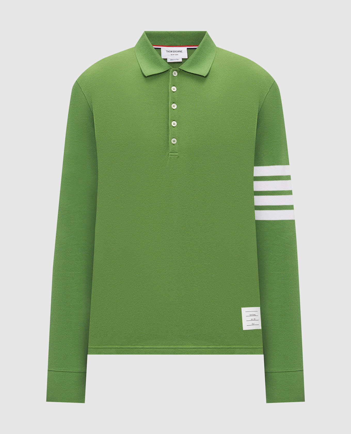 Green polo shirt with logo patch