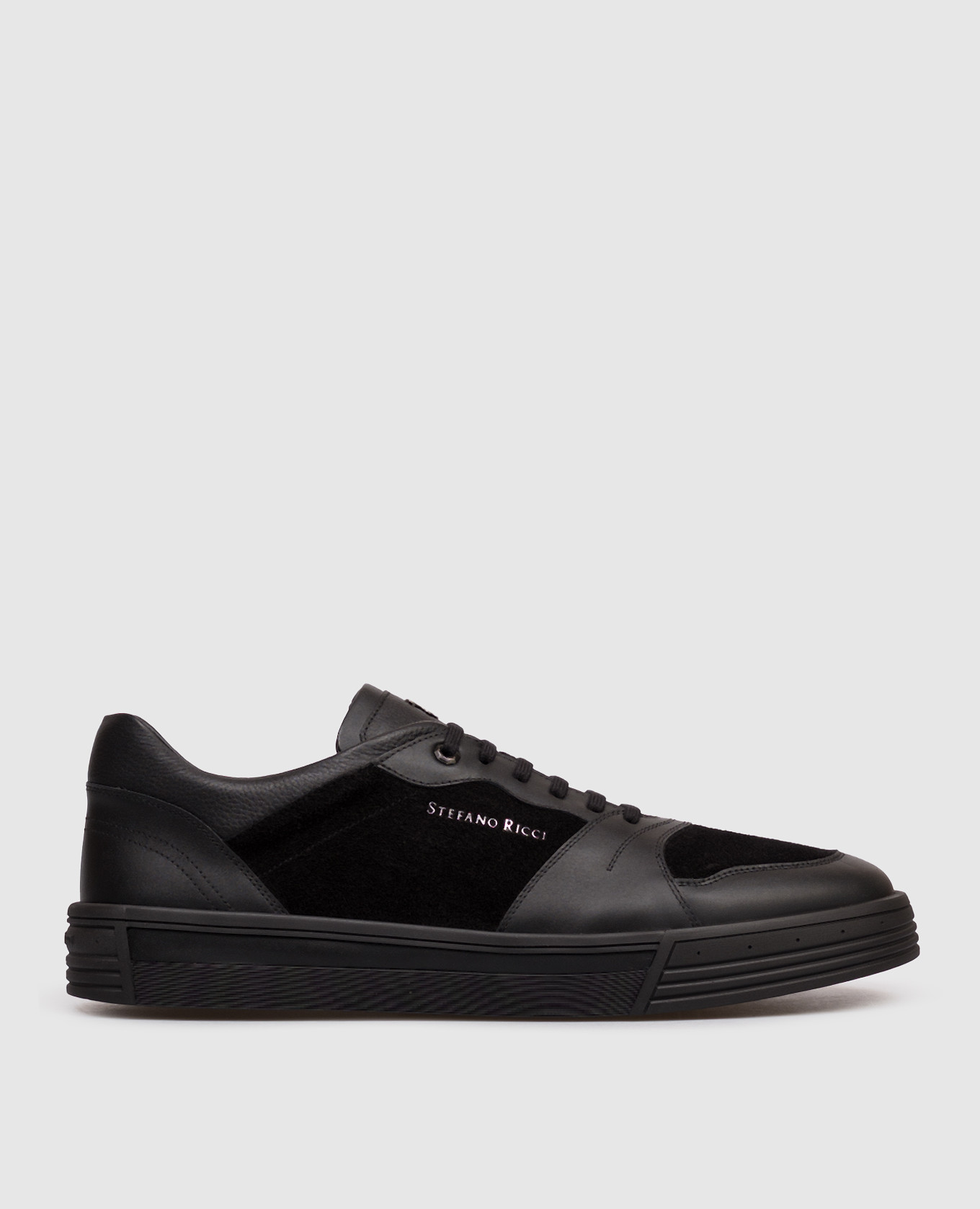 Black leather sneakers with textured logo