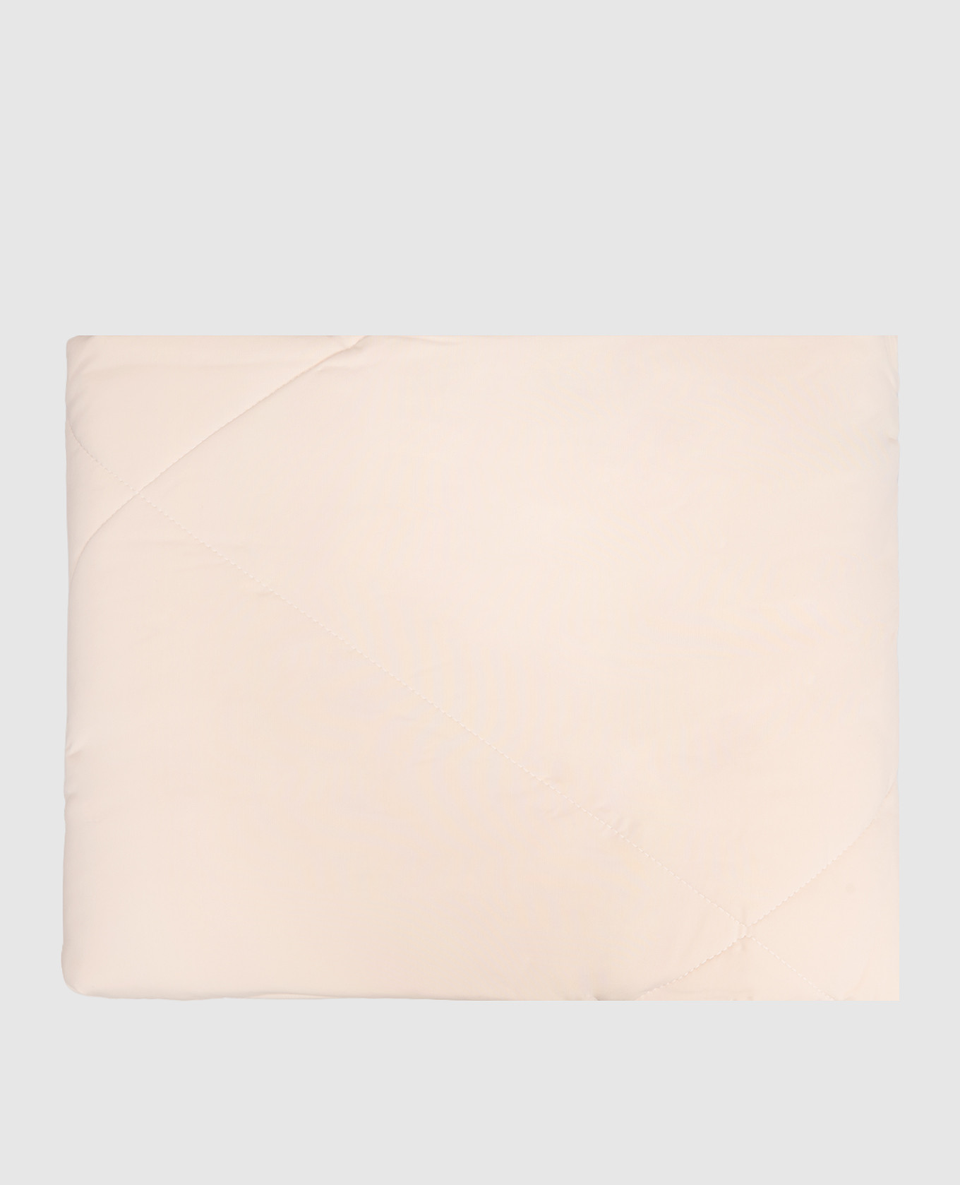Beige quilted cooling blanket