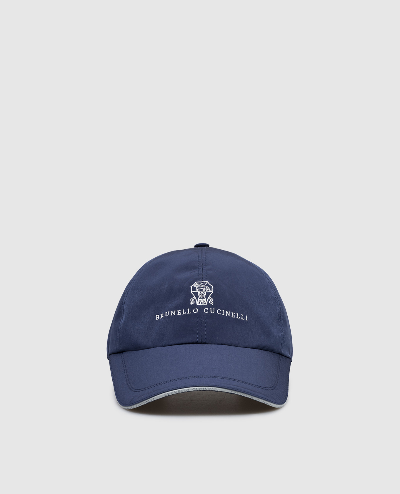Blue cap with embroidered emblem