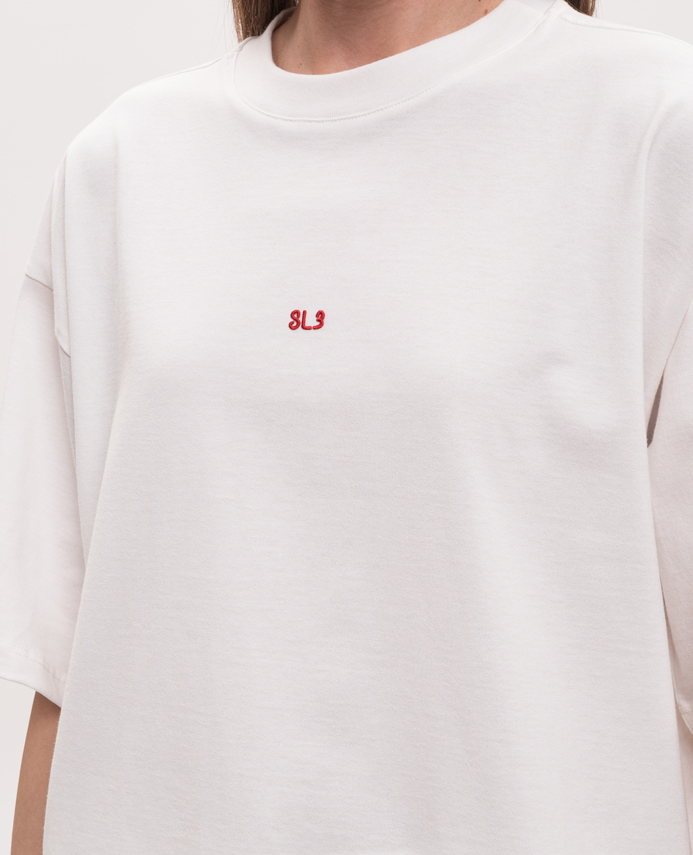 

White T-shirt with embroidered monogram logo Solotre