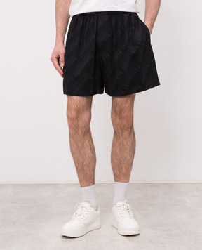 Balenciaga Black shorts with logo print 871411TUL02