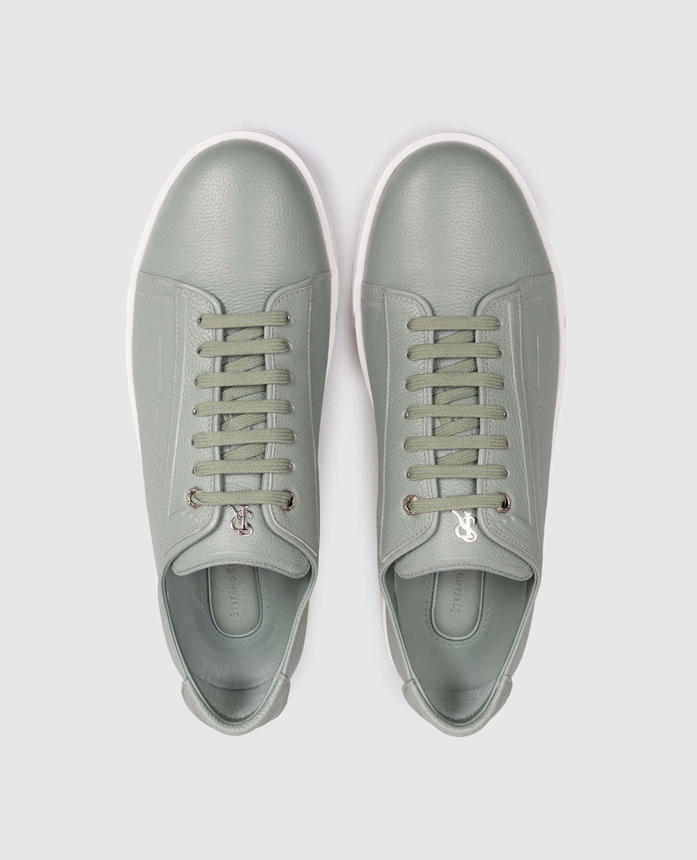 

Green leather sneakers with monogram logo Stefano Ricci