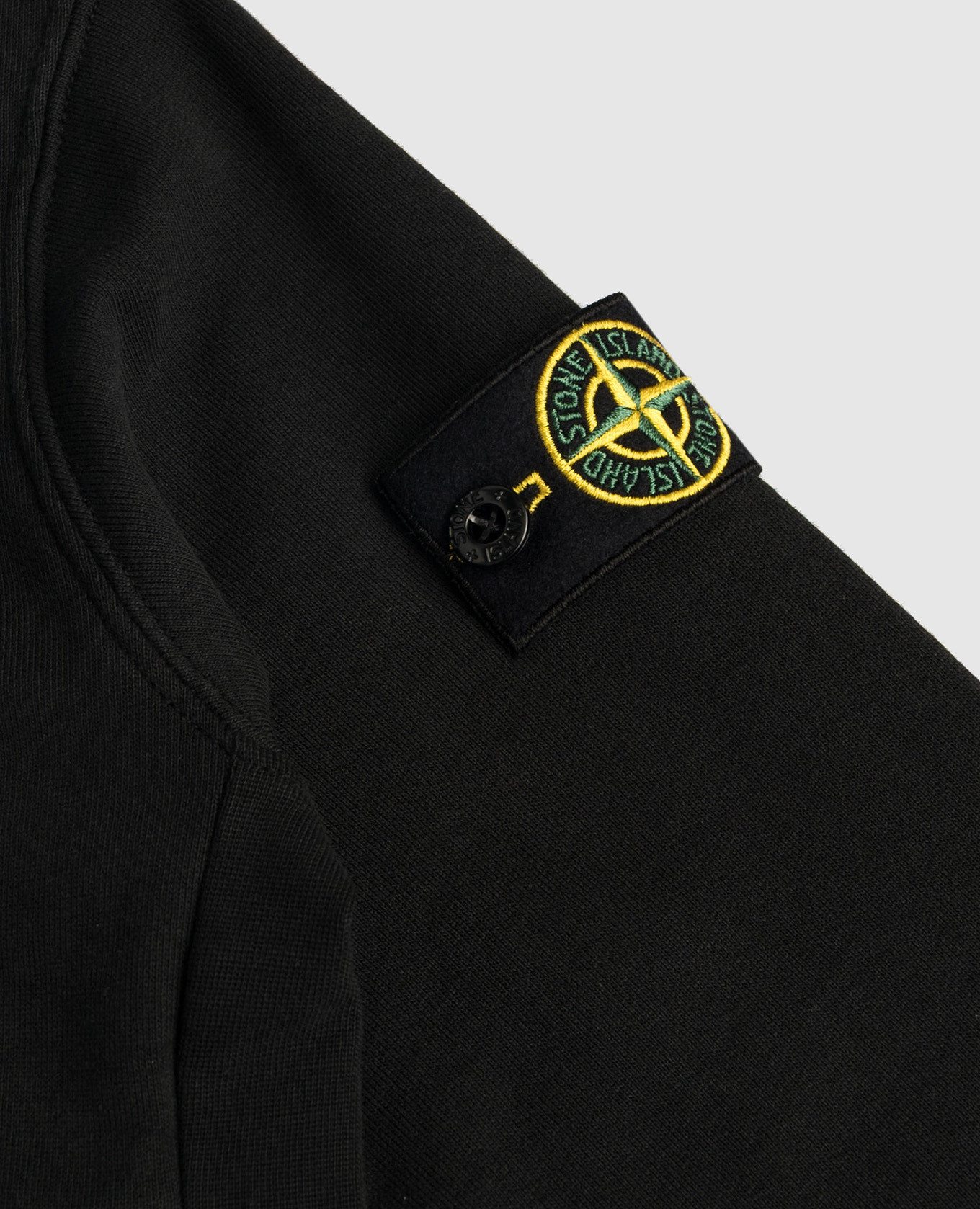 

Children's black sports jacket with logo Stone Island