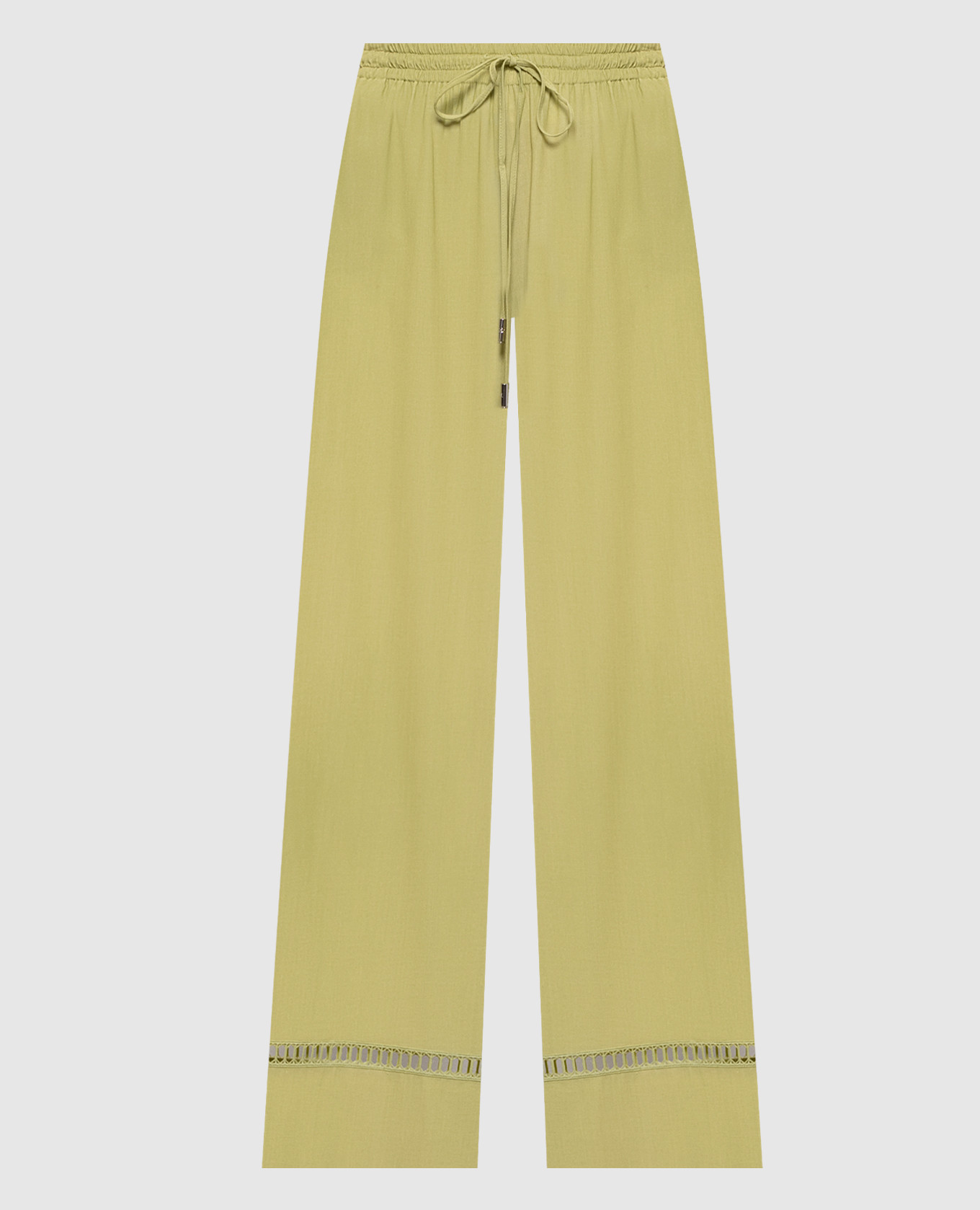 Green pants with openwork embroidery