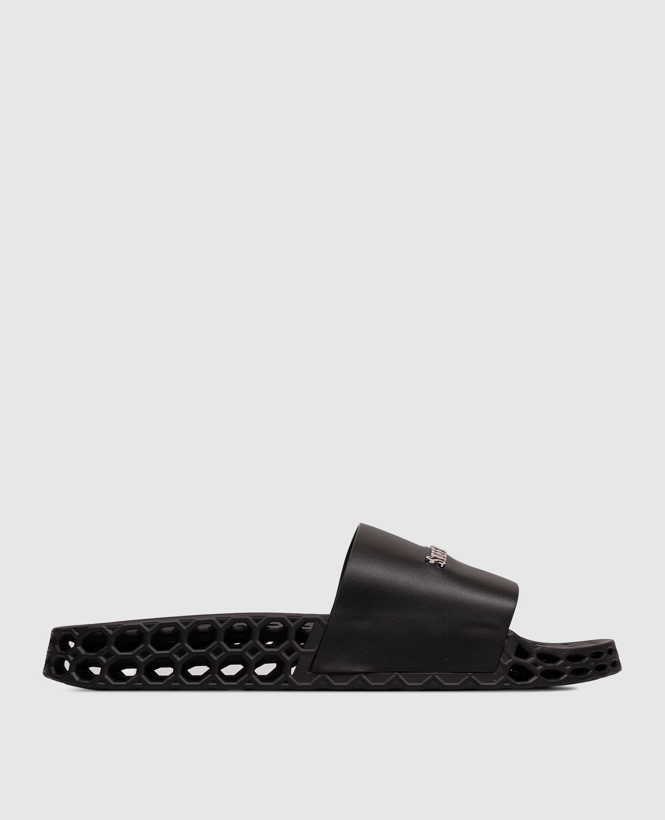 Black perforated sliders with textured logo