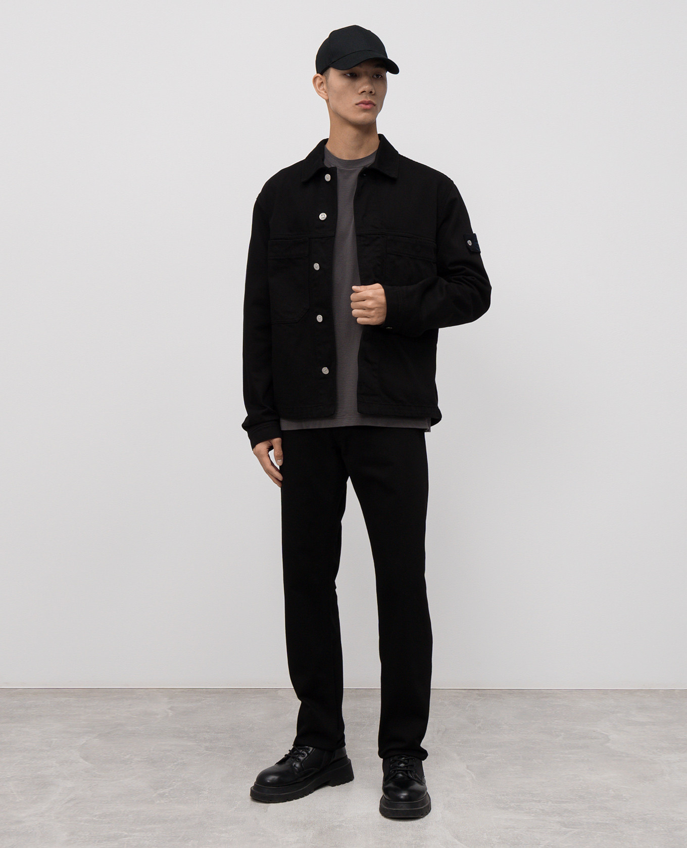 

Black jeans with logo patch Stone Island