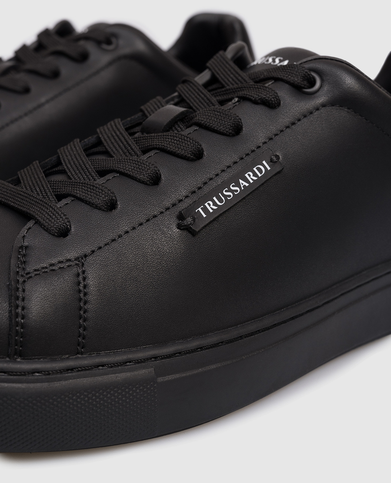 

Black leather sneakers with logo patch Trussardi