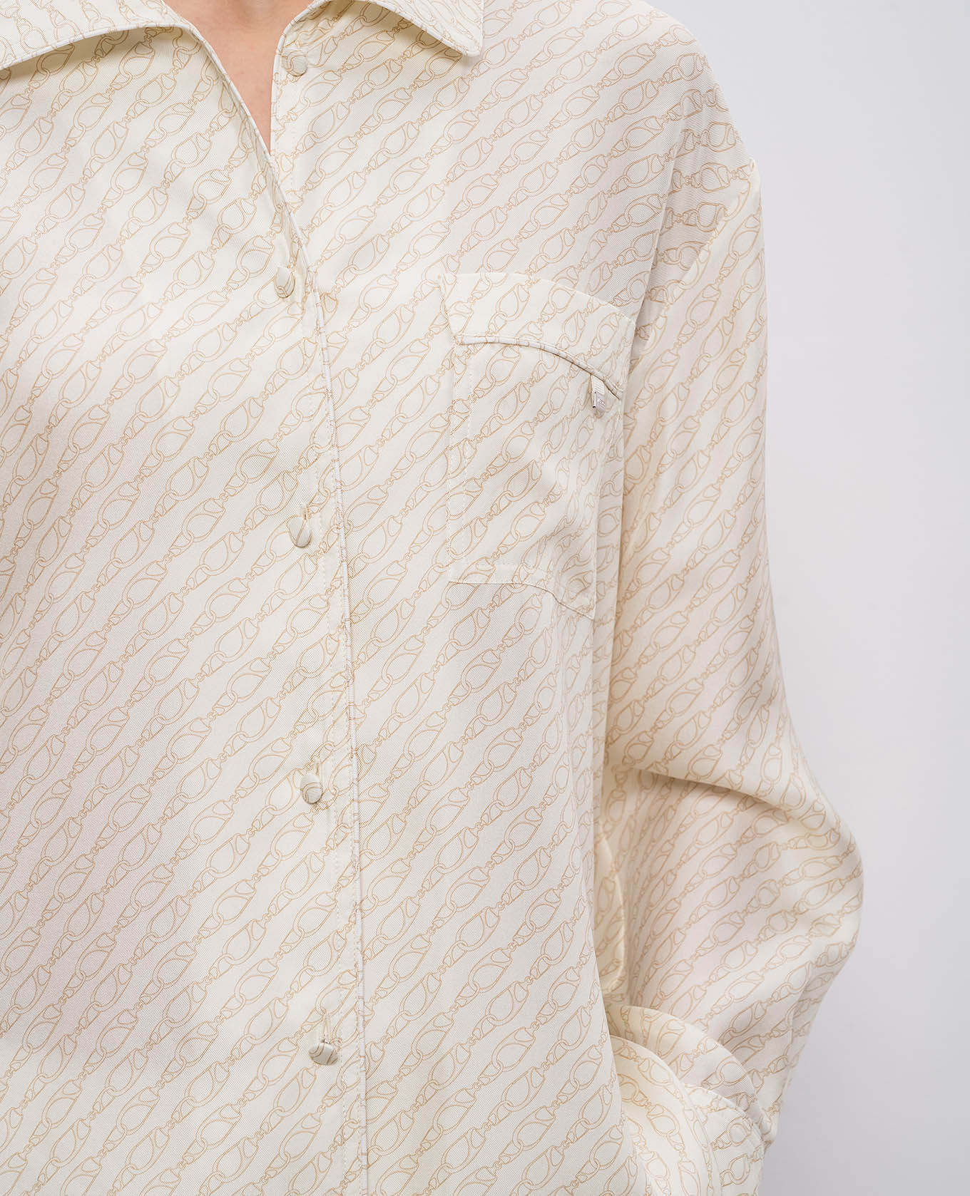 

Beige silk blouse with branded print Herno