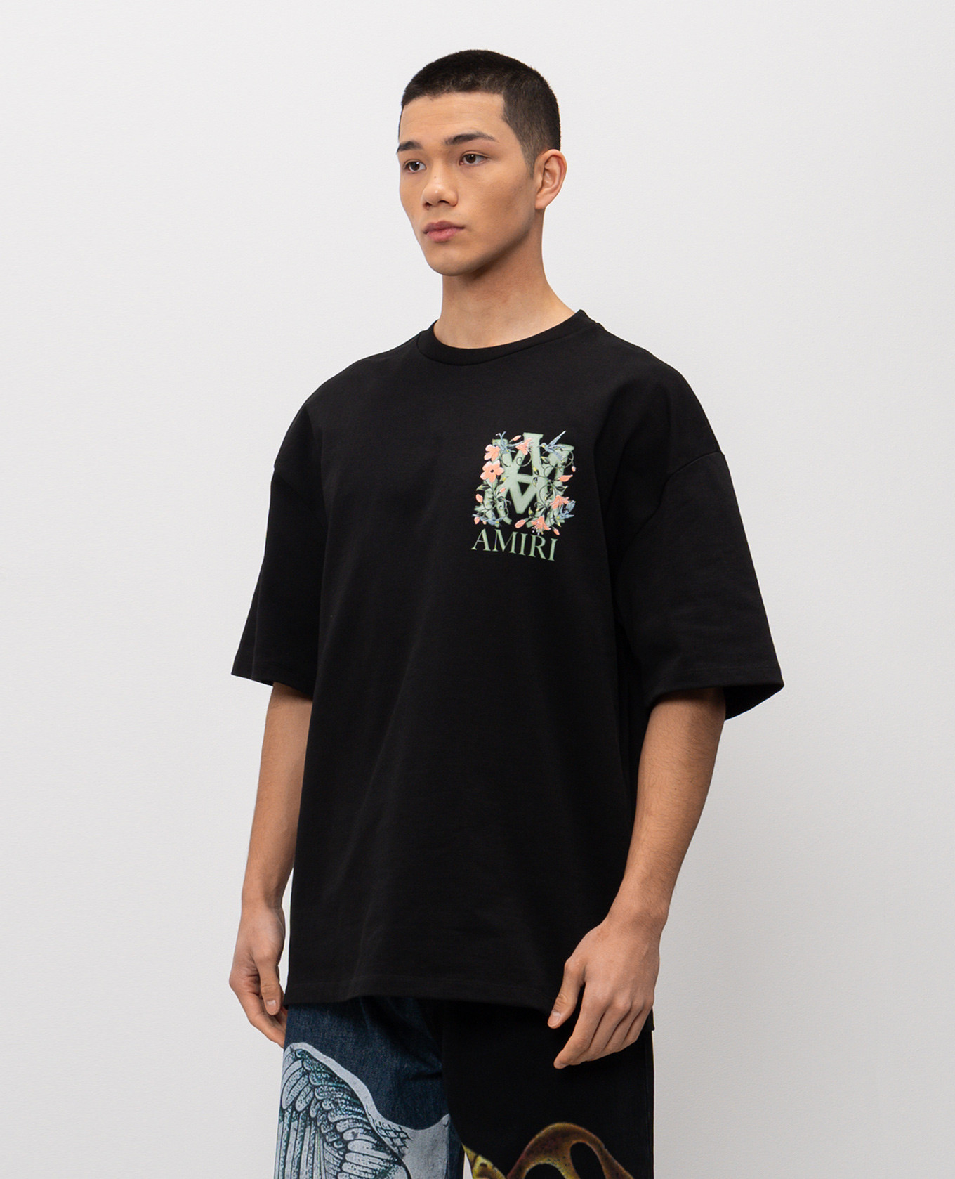 

Black T-shirt with floral print AMIRI