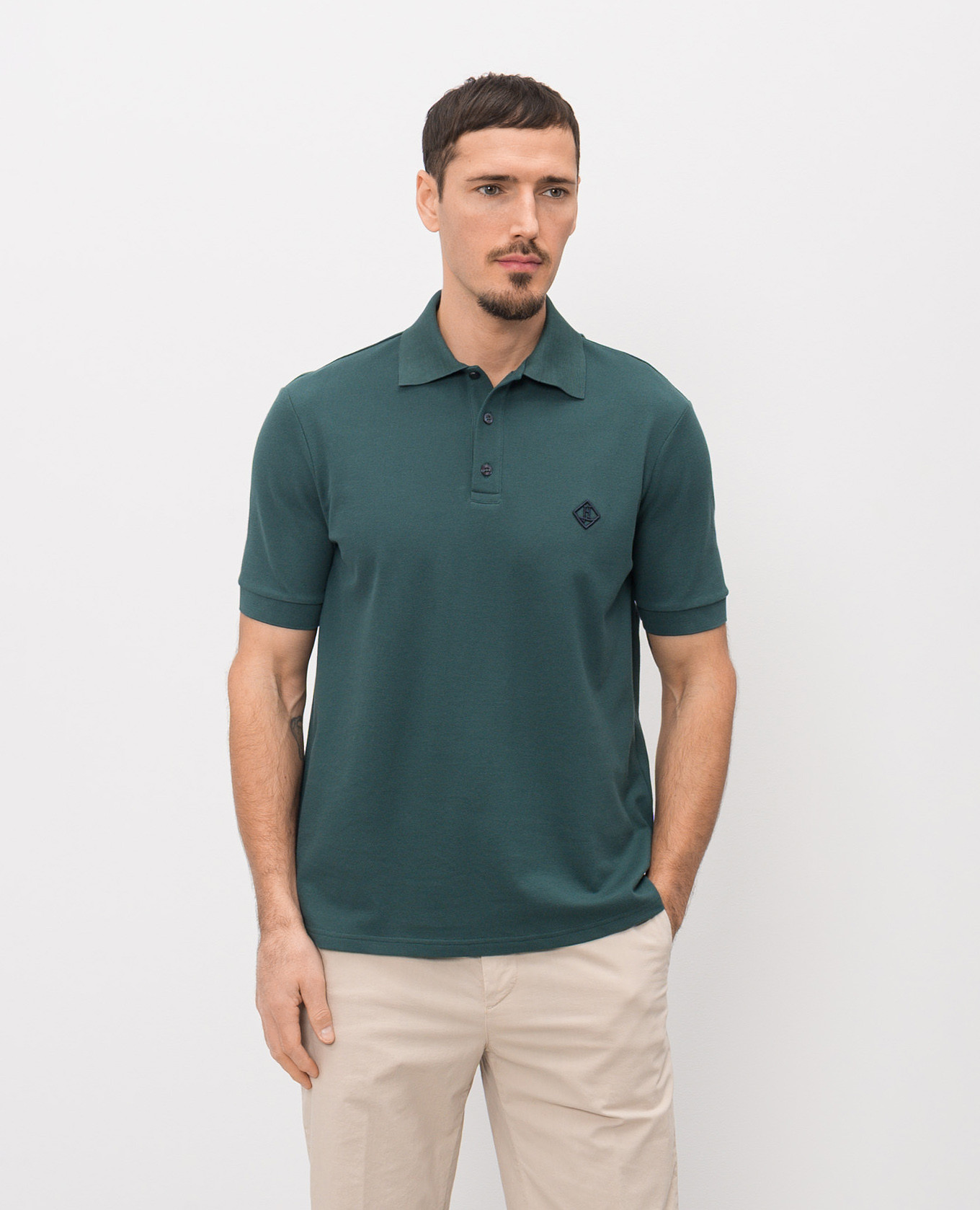 

Green polo shirt with monogram embroidery Herno