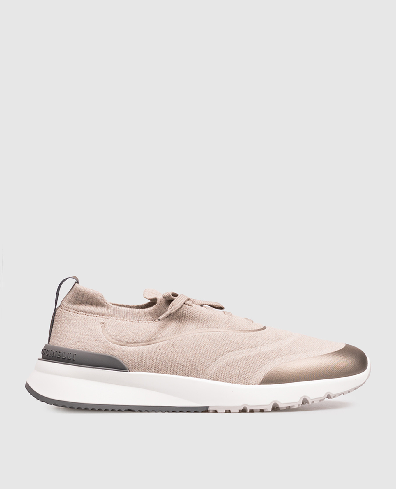 Beige sneakers with textured logo