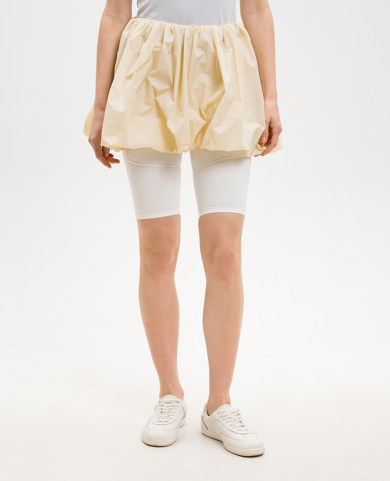 

Yellow mini skirt with drapery Juun.j