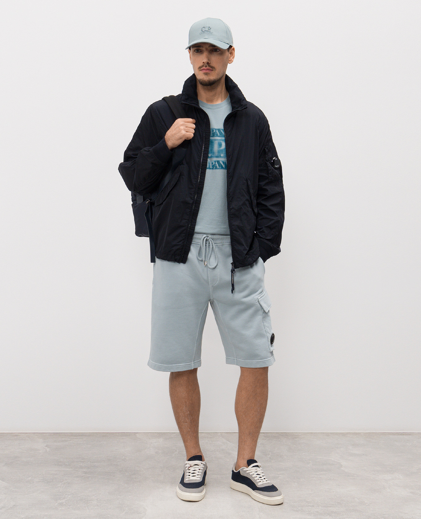 

Blue windbreaker with patch C.P. Company