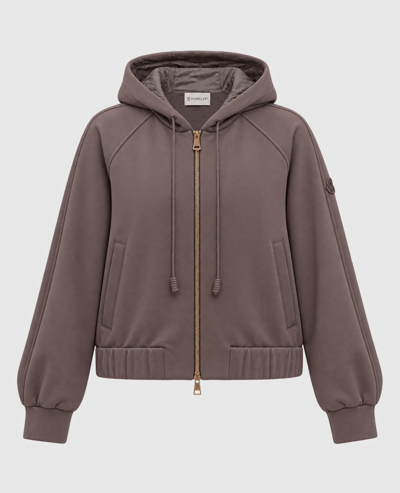 Brown sports jacket with logo patch