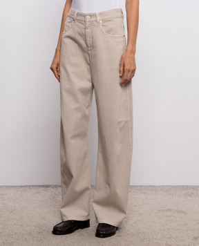 Brunello Cucinelli Beige jeans with logo patch MH137P4057