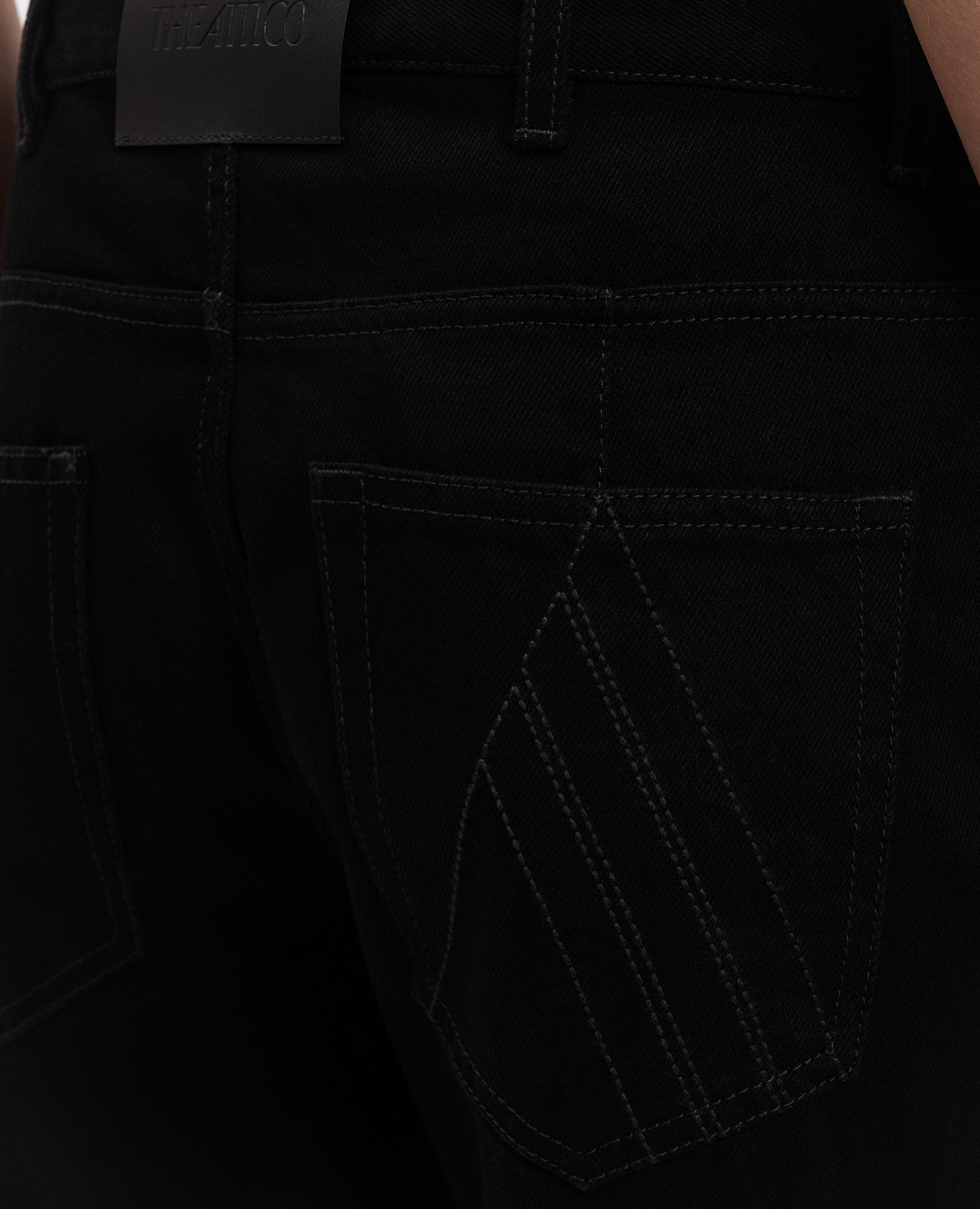 

Black jeans with logo patch The Attico