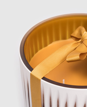 Onno Akosua M candle with Sunset scent in a glass candle holder ON601ST