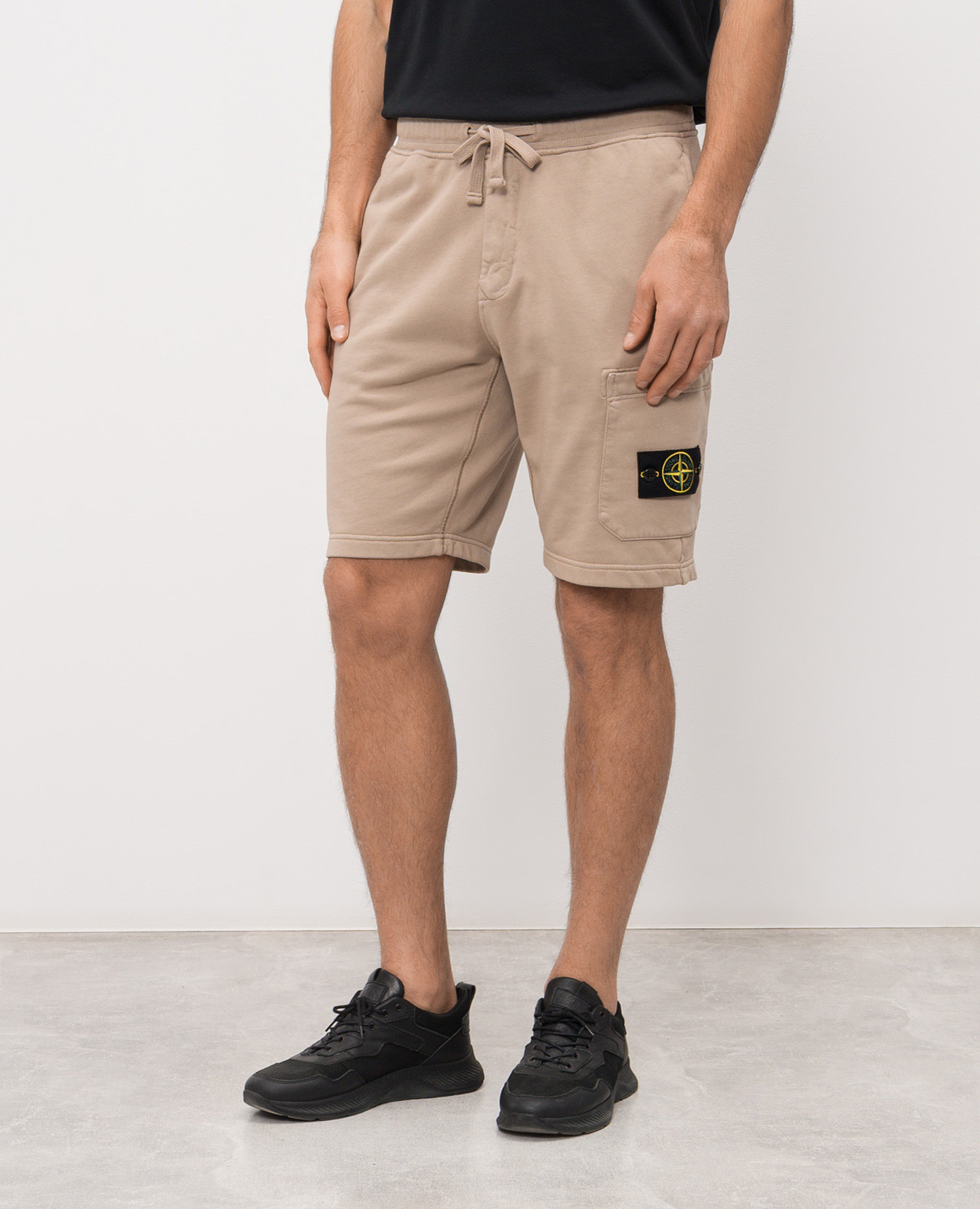 

Beige shorts with logo patch Stone Island